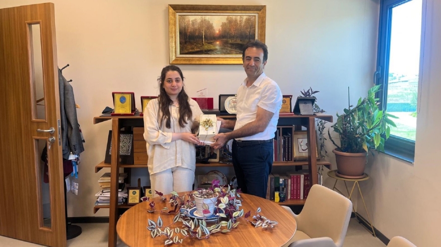 A Gift was Presented to Leyla İlhan, the Winner of the Traditional Book Raffle